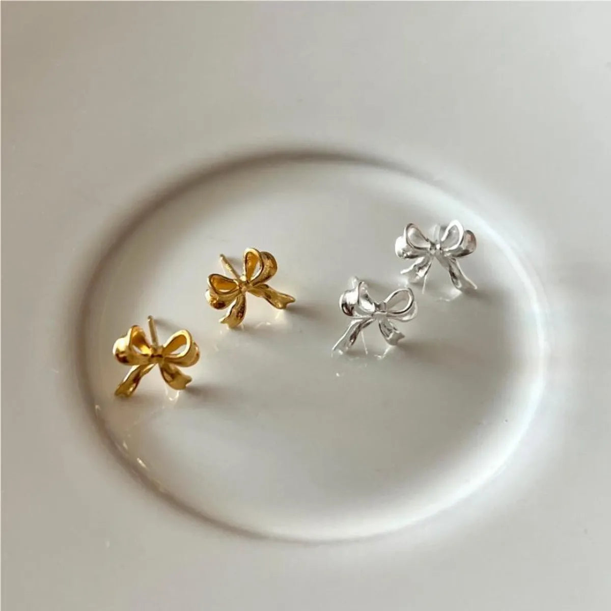 Ladies crystal stud earrings -1 Pair Simple Style Bow Knot Plating Sterling Silver Gold Plated Ear Studs