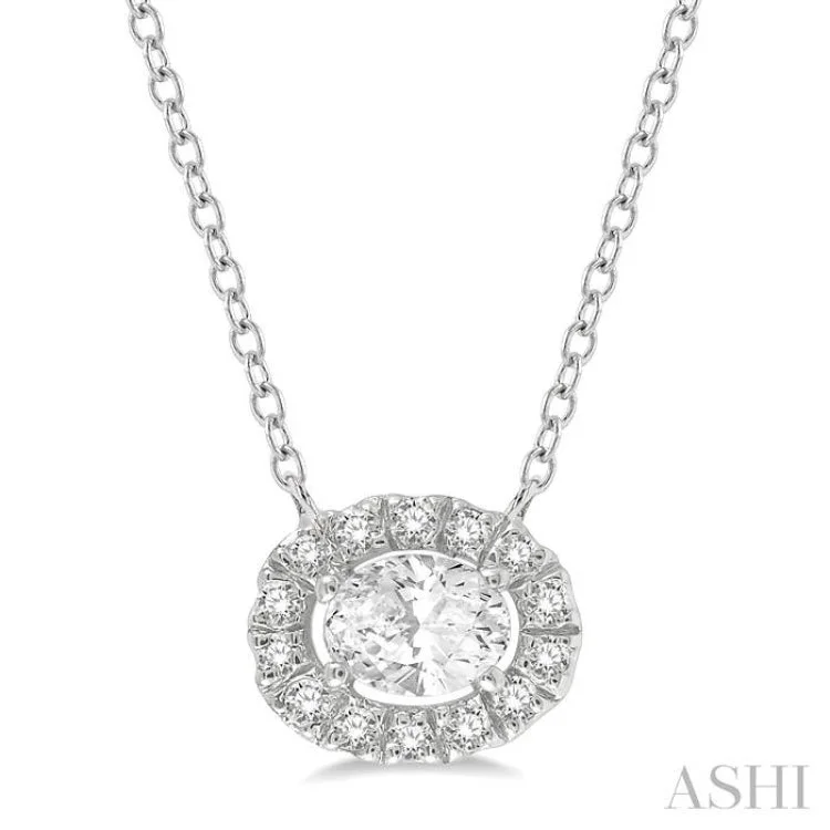 necklaces with green emerald -1/4 Ctw Oval and Round Cut Diamond Halo Fashion Pendant With Chain in 14K White Gold