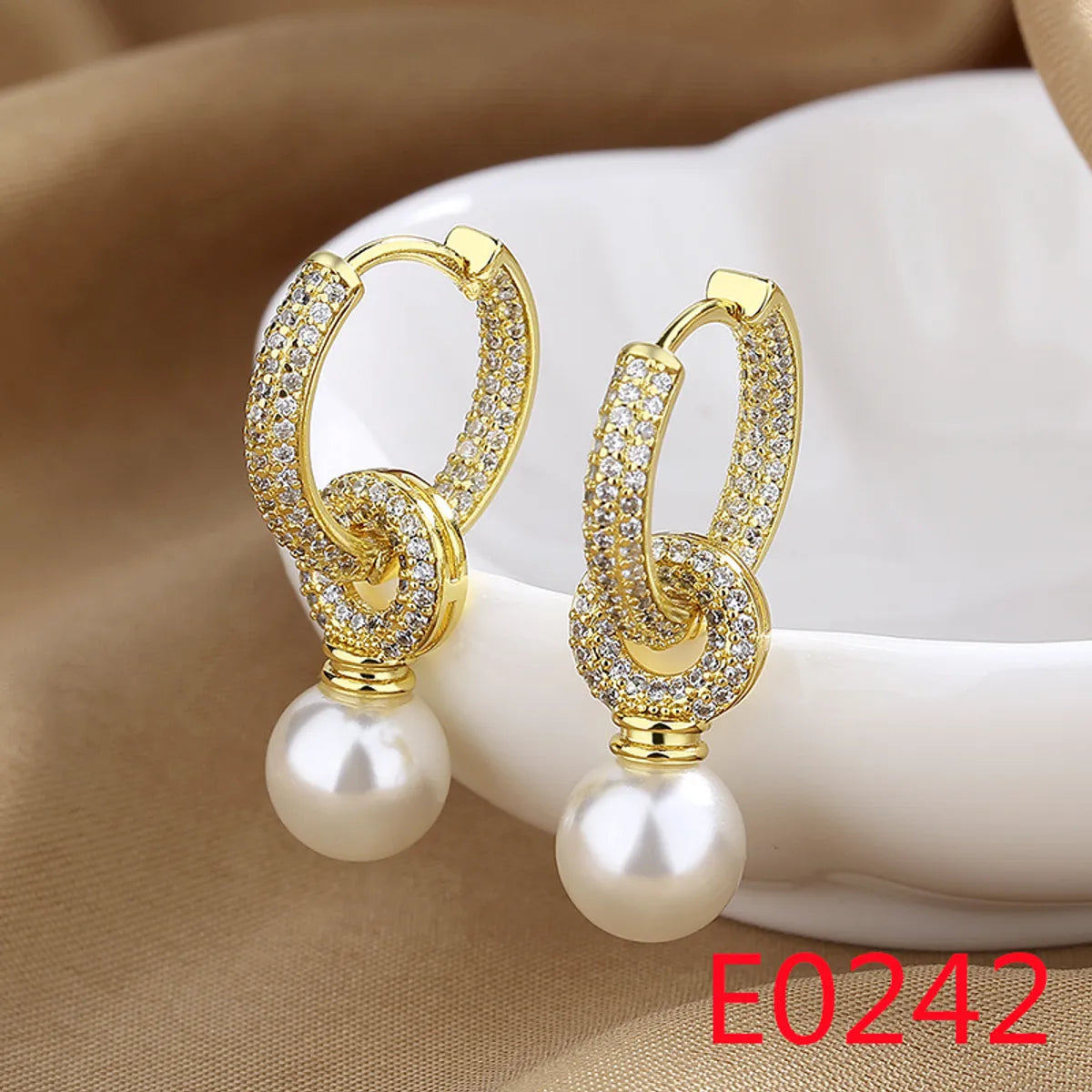 E0242 (Gold)