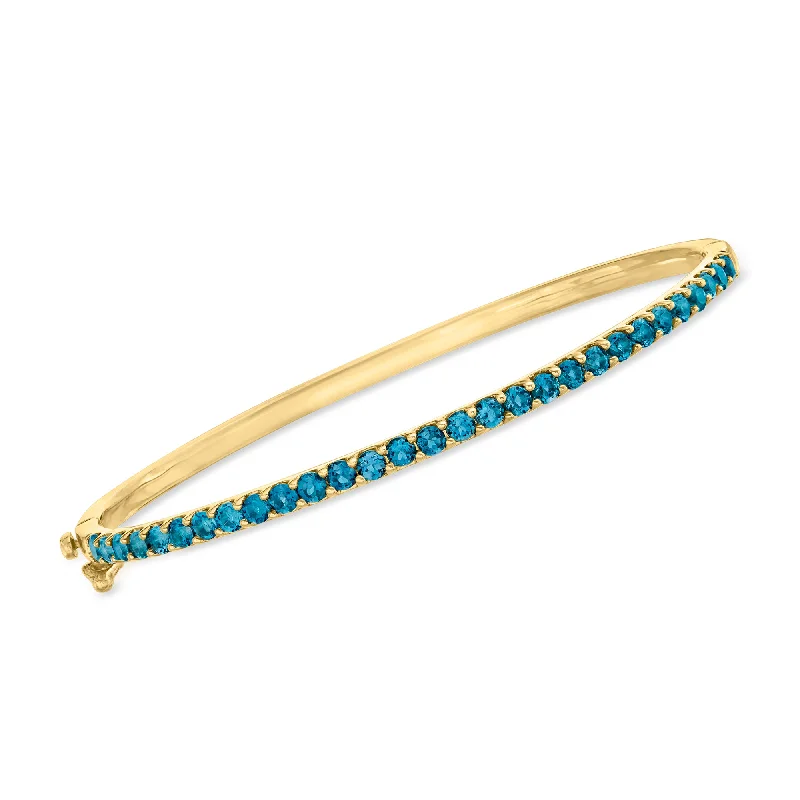 Simple gold cuff bracelets for ladies -Ross-Simons London Blue Topaz Bangle Bracelet in 18kt Gold Over Sterling