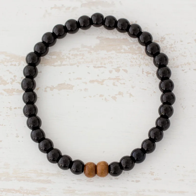 Ladies lightweight bracelets -Corners of the Universe Jet and Pinewood Beaded Stretch Bracelet from Guatemala