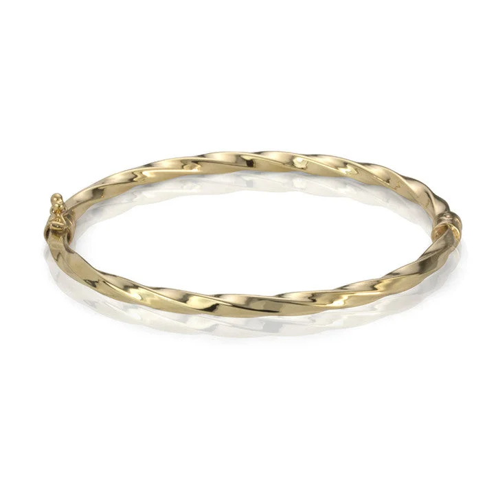 Ladies ruby bracelets -14K Yellow Gold Twisted Bangle